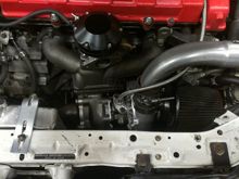 old car air filter placement. trapped between the turbo and the frame/body and the block really not getting any cold air