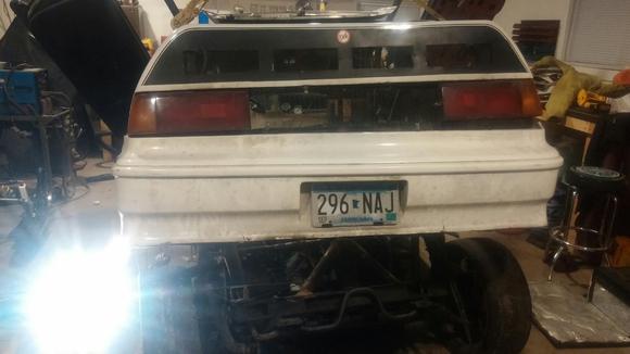 after torching the mounts ad multiple fires due to expanding foam we lifted the car over the subframe and rolled it out