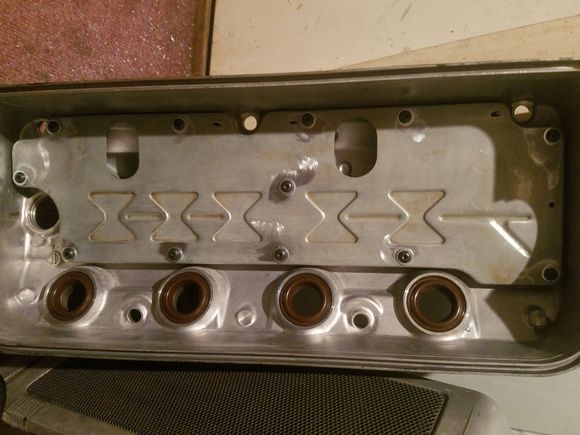 I forgot to get a pic of the inside before replacing the baffle plate. But I used a very small bead of Hondabond between jam nuts and VC and between the baffle plate and VC before tightening everything down.
