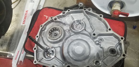 Old side cover... long oil feed tube is transfer over; shorter one is included. 