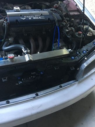 New hood latch and removing all of the red washers and adding blue.