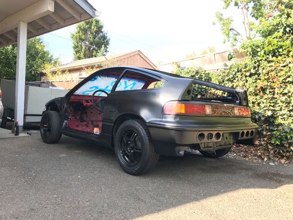Painted the shell Satin black yesterday. Still need to finish cutting some stuff under the wiper cowl and paint the front half of the interior. 