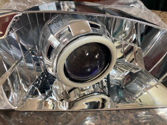 Projector back in the reflector bowl.
