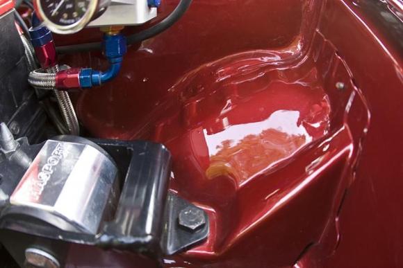 Aeromotive FPR. Custom ss fuel lines. Hasport mounts. Custom shaved bay. Paint PPG Blaze Red Crystal (OEM Chrysler color).