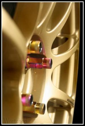 Advan RS gold wheels. with Muteki Neo Chrome Racing Lug Nuts