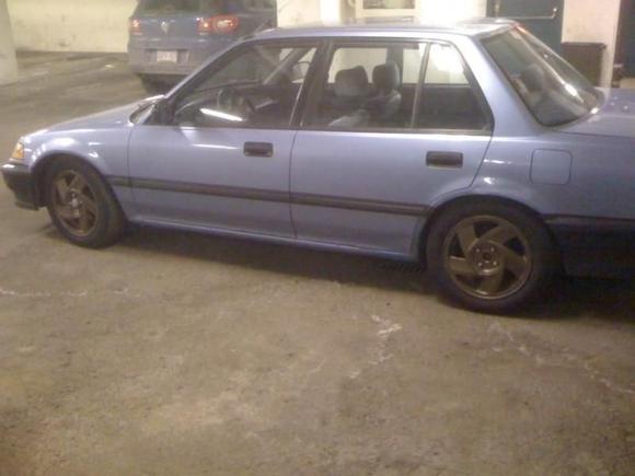 My sedan - 15" Escort GT rims. Tired D16A6 that was swapped in by previous hack owner...