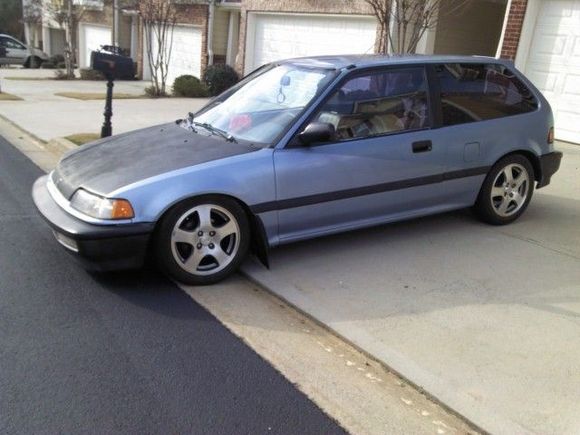 black hood, 20% walmart tint in the back (removed to professional tint) ebay springs and sleeves