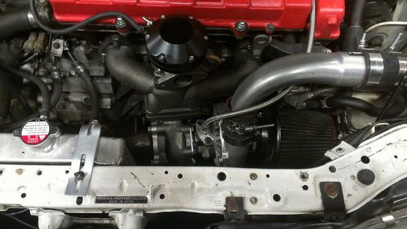 old car air filter placement. trapped between the turbo and the frame/body and the block really not getting any cold air
