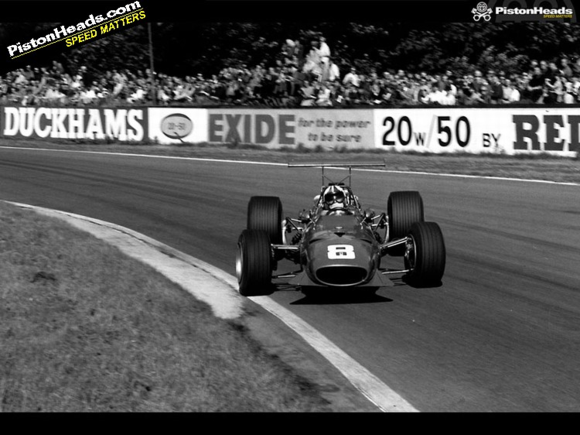 Chris Amon in Ferrari at Oulton Park, back before slicks and tons of downforce........
