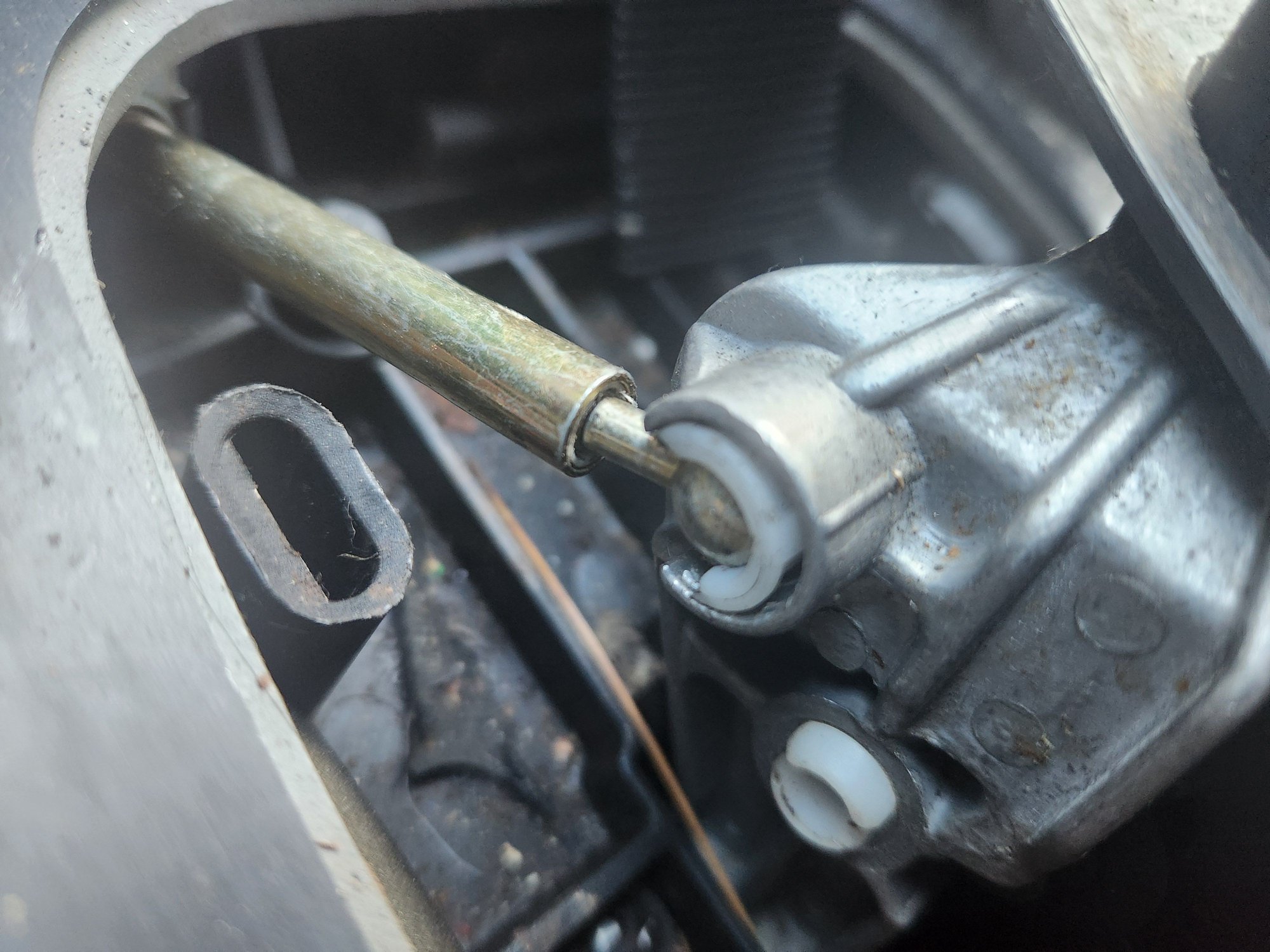 Shift cable and white grommet both popping out