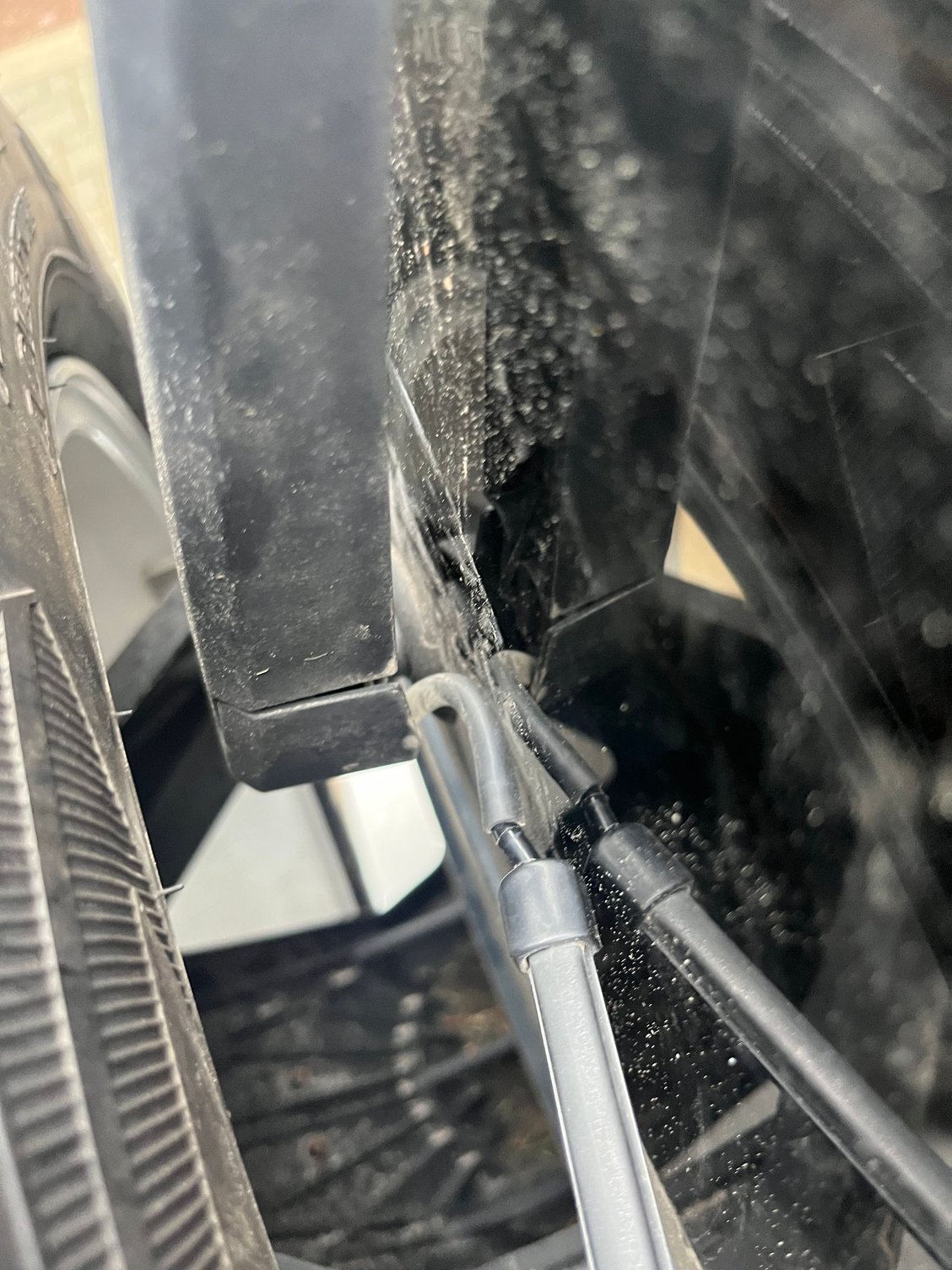 Washer nozzle attaches to base of blade. 