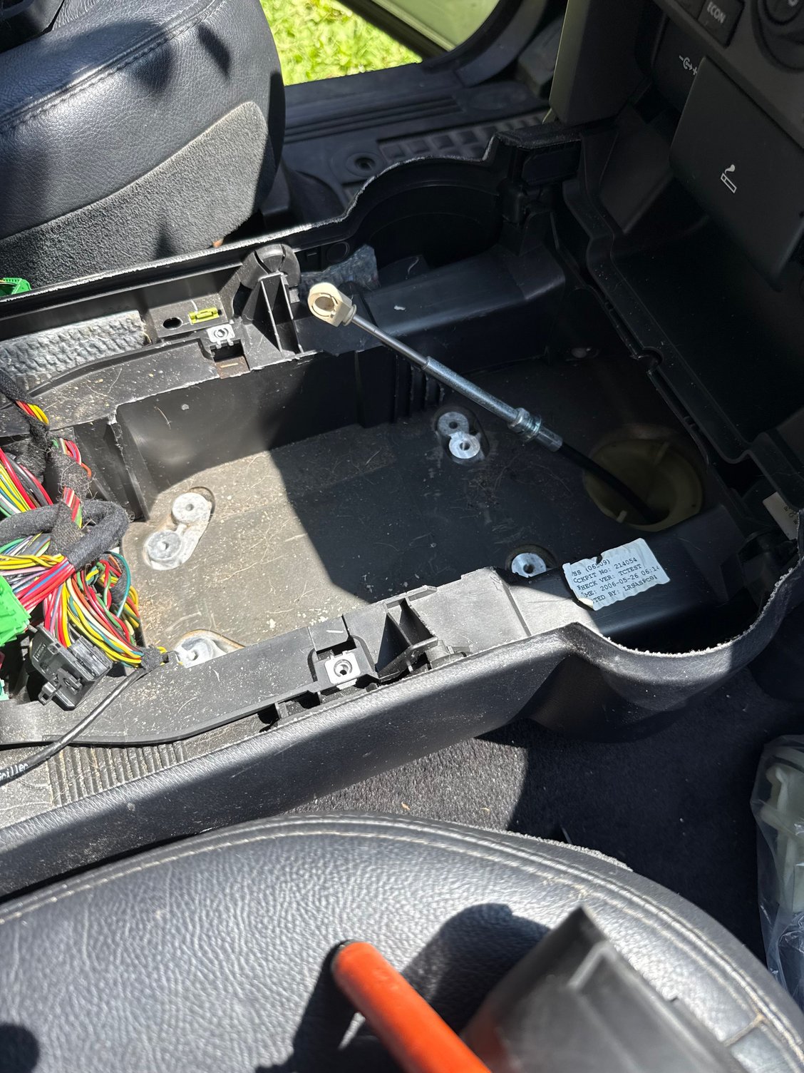 After prying the ball/socket out of the shifter assembly 