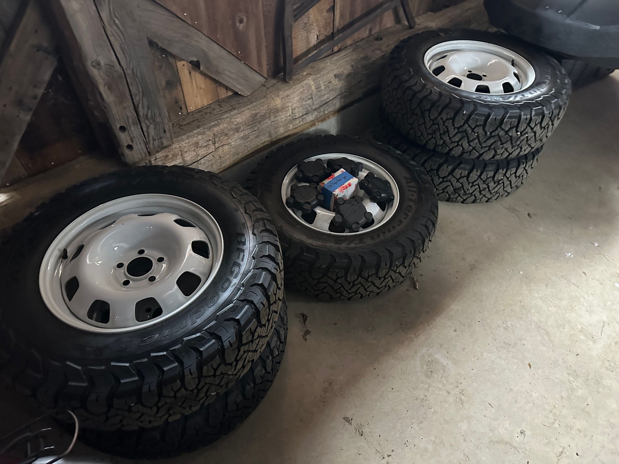 Wheels and Tires/Axles - As-new set of five (5) 265/70/18 BFG All-Terrain K03s mounted on factory steel wheels - Used - -1 to 2026  All Models - Burlington, VT 05401, United States