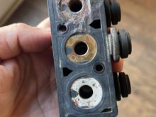 Rear valve block. Left and right should look more like the center. They were totally corroded.