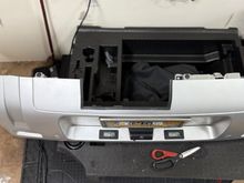 I cut my own bumper to accommodate the tow hitch.  I used sticky rubber trim to a