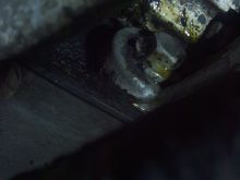 And just above this bolt is some sort of block like thingy. Has electric going to it. It has fluid around it as well.