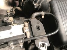 Nasty jb weld on the entry point to radiator, hose crack fix in between