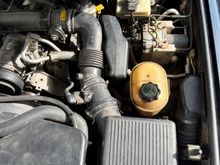My engine bay, with airbox and intake tube