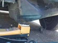 Step 14c Using Helper or a handy jack gently lower the tank from the left