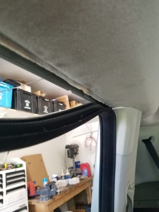 Pulled down the door(body) seal for both front and rear doors to push the cable up into the headliner