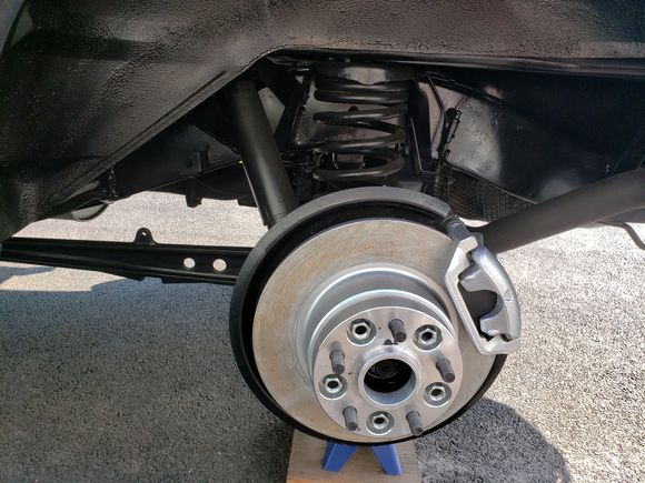 Cleaned up the rotors and brakes. Added 30 mm spacers.