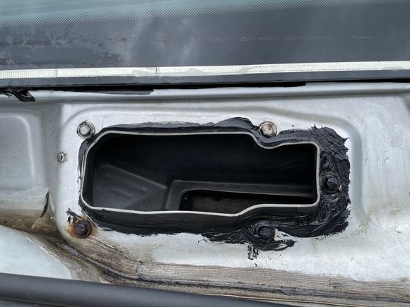 This is what I found water was running  straight into the Air intake and behind the glove box. 