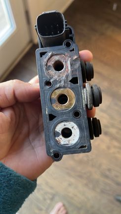 Rear valve block. Left and right should look more like the center. They were totally corroded.