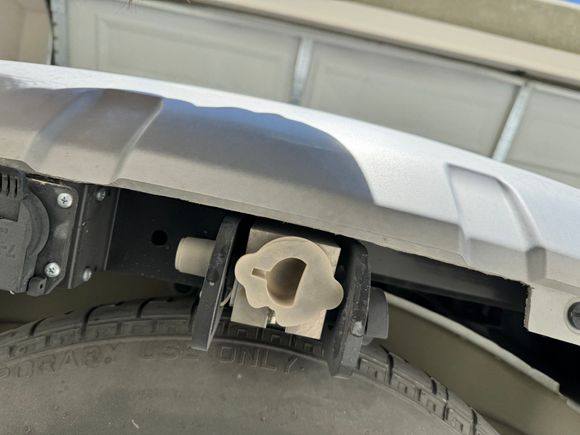 You can see the trimming on the underside of the bumper, it also makes a full size spare probably a tighter fit. 