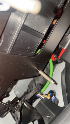 Looking right (outboard) of battery under passenger seat