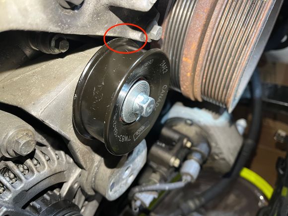 Interference of new idler pulley with bracket