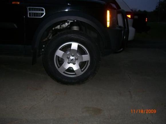 Front shot, off-road height with TODCO Adjustable Height Joining Rods @ -8mm and Fuzion XTi 285/60-18 All-Terrain Tires.  Have 1.30" Wheel Spacers for front, but broke a stud, they are off till fixed.