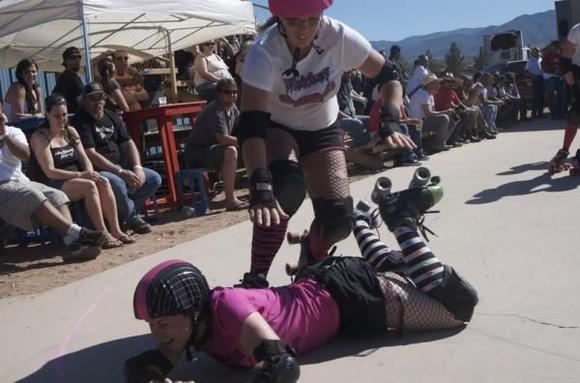 She landed with her knees ON my back...scary...I couldn't move at first and had weird nerve pulses through my whole body because she landed on my spine!