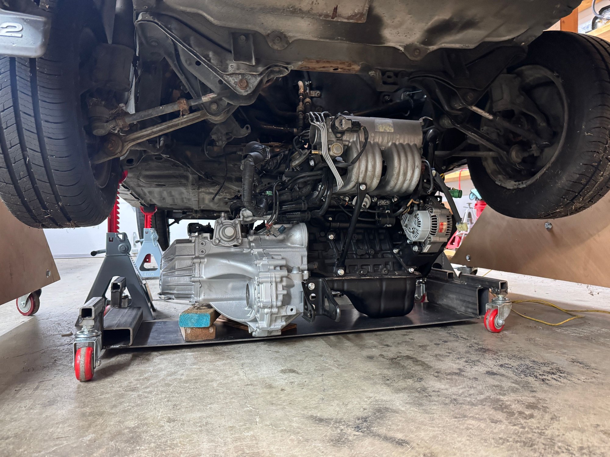 Getting ready to stick the built (forged pistons, rods, crank, mild cam) engine and 6 speed transaxle (5 speed is stock) back into the MR2.