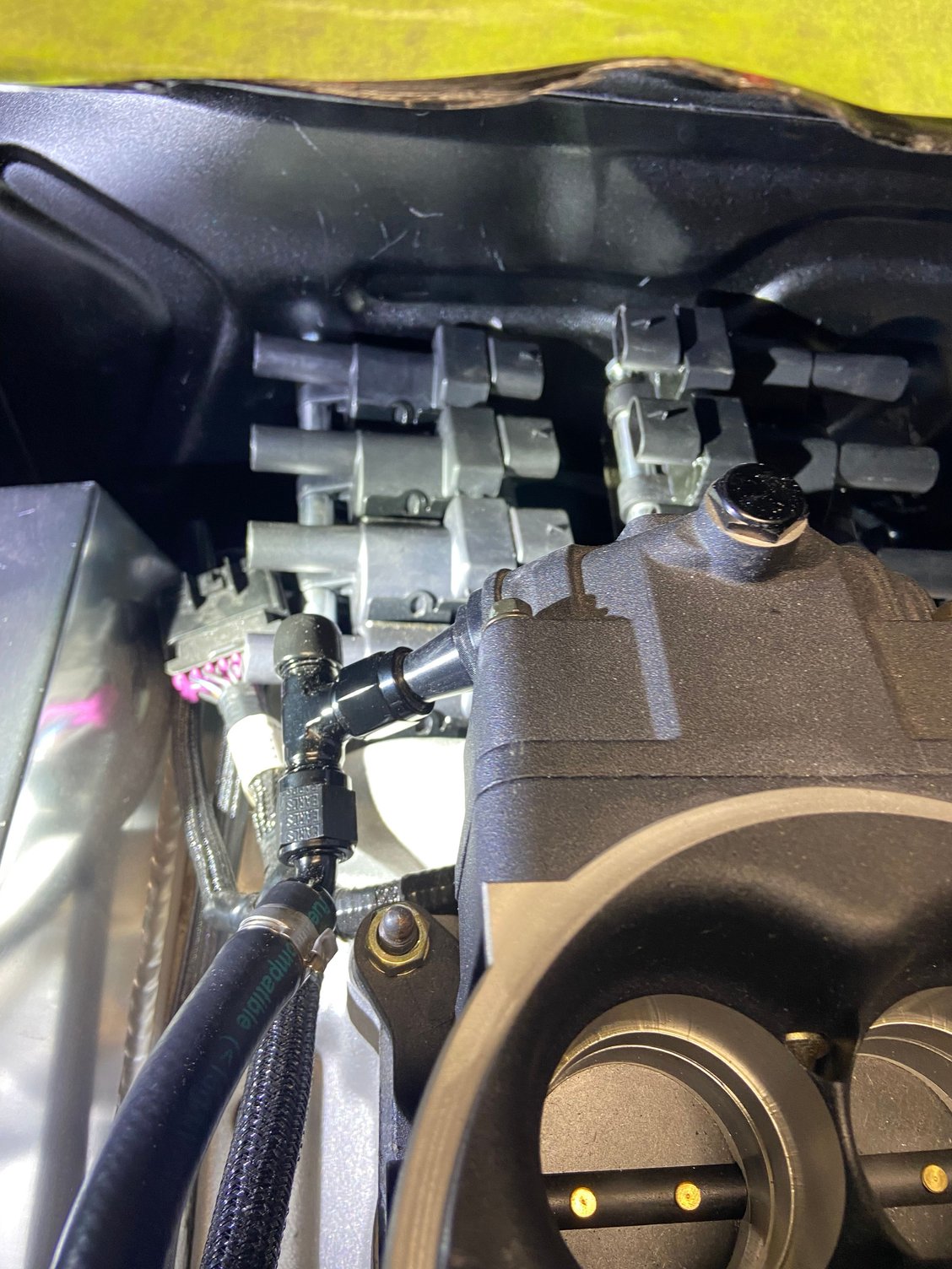 Possible and most reasonable spot to mount the coils. This would make it appear to have a distributor. I wanted to mount on frame rail below headers but room was not my friend. 