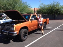 This is at the show.  The color ont he truck is GM Atomic Orange.  Looks way better in person.  That's Naomi in the picture.  300+ hours on the truck herself.  She's very proud of it.  We built it from when she was 14 to 17.