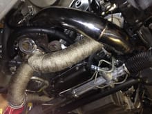 Here you can see the lines coming around the wastegate pipe down from the turbo then straight back. Again these are wrapped in a DEI sleeve.