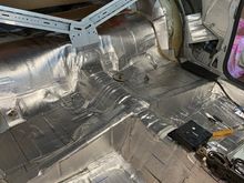 The floor of the car is pretty well done as far as sound deadening material goes.  I'm still going to apply some to the doors and the roof.