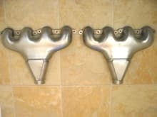 ls7 exhaust manifolds (headers) with large flange removed, transition to 2 1/2 collector, constructed in stainless, satin finish. This is for the LS1 in the Avanti.