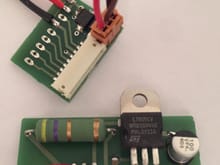 Power supply board plugged into breakout board