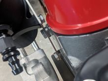 Washers to space out catch can to clear valve covers