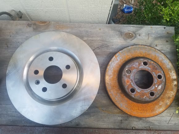 14" rotors make 11" look tiny. Gained about 1.5" of useable brake leverage.