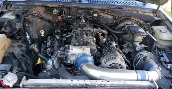 All buttoned up! Stage 2 turbo cam from Summit Racing, ls9 head gaskets, reused head bolts, 706 heads, pac 1219 springs. Fbody radiator . Only has 1 fan onit right now need to order another one.  