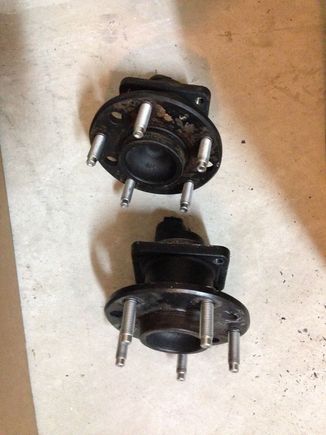 Also have these OEM hubs w/ new stock length studs. Unknown miles, but have no play. $60 shipped.