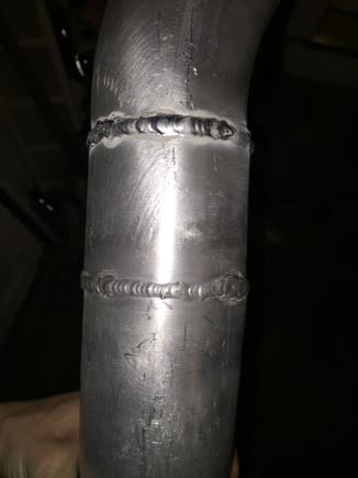 Some of my welds on the 16ga aluminum piping. Need to work on being more consistent with my filler hand. The penetration is spot on so im happy.