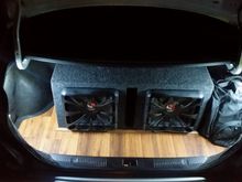 Wood floor and trimmed out around the box and moded light to led strips on both sides all done by "Shock Customs"