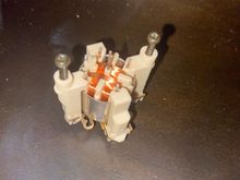 This is the tachometer stepper motor. The middle shaft broke out, the one that came out is in my current cluster in my car. (This is a spare not the issued one) 