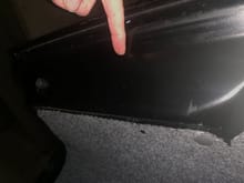 backside of trunk lid - fickle finger points to damage location on outside