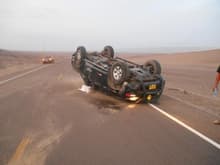 This is what happen when you skid on sand at 210 Km per hr in a Toyota Hilux, you flip over.