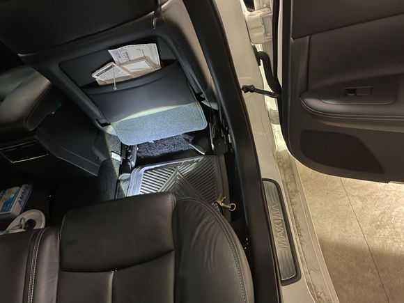 Unhook the flap under the seat and it will expose the cushion