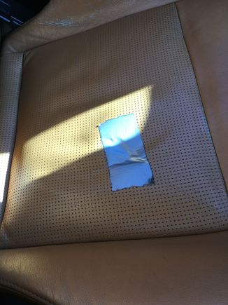A hole in my elite burnt orange driver seat. Please assist me with this matter. Thank you